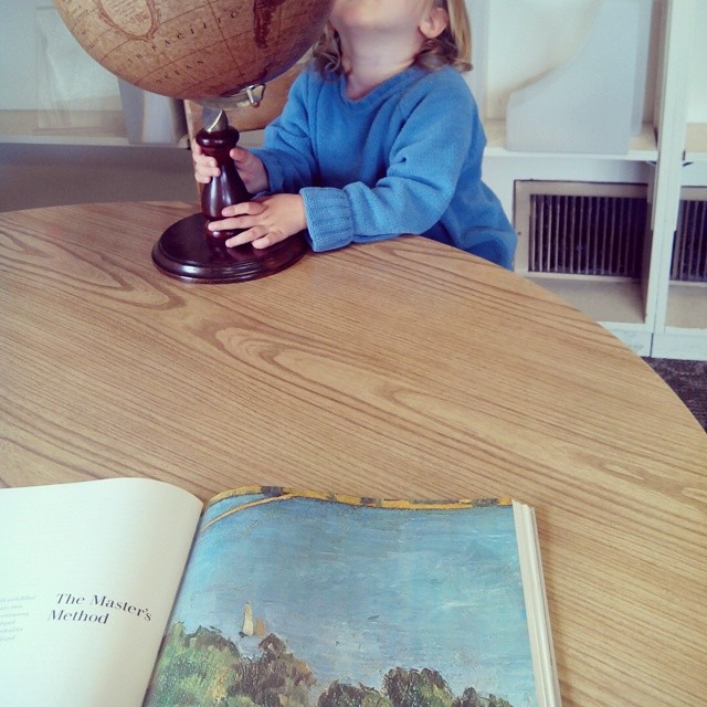 At the library: Cezanne for me, globe for her