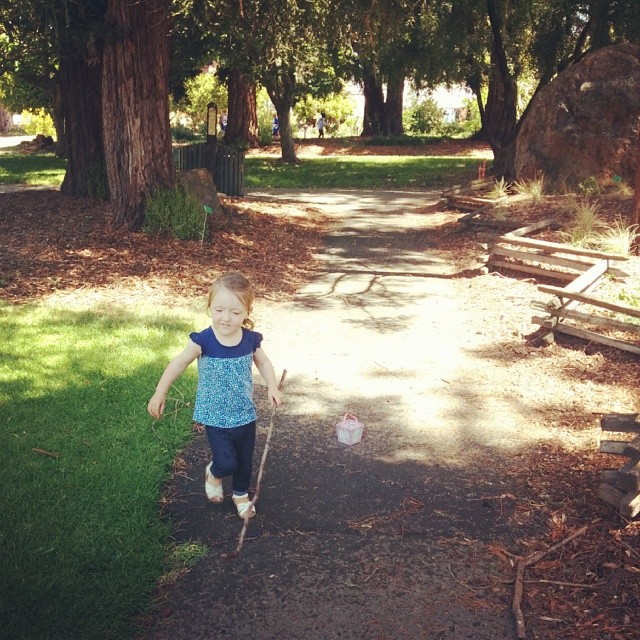 Running through sprinklers in the gardens