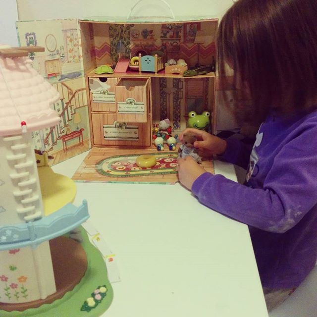 playing with her Calico Critters and friends (and still covered in flour from helping me make pancakes)