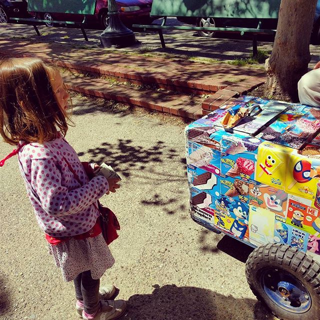 Buying her own ice cream with money from G&G