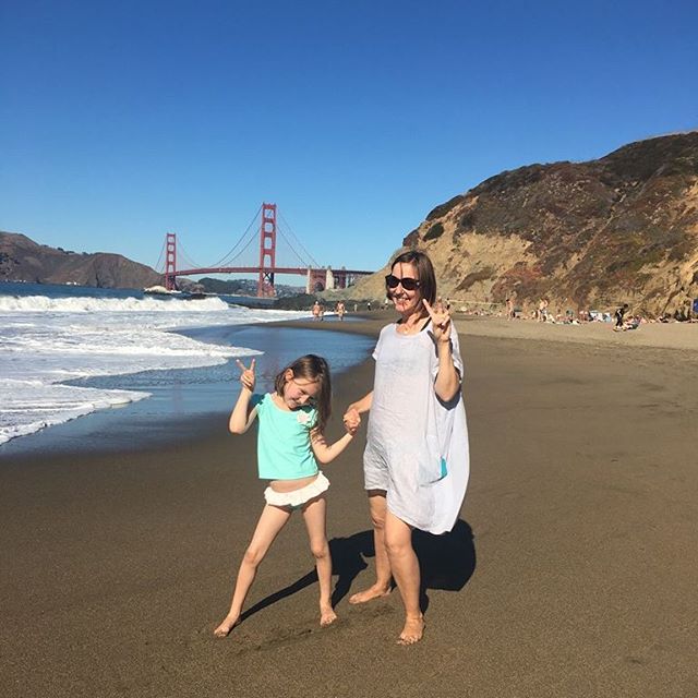 At Baker Beach, a day I will never forget. Dipping our feet in the freezing water, snacking on caramel corn and spying naked men everywhere.